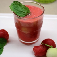 Image of a glass of the ginger melon mojito