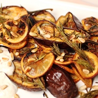 Image of roasted rosemary eggplant with tahini yogurt.