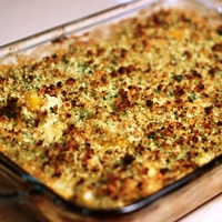 Image of baking dish of the cauliflower and winter squash gratin with a crispy golden brown top
