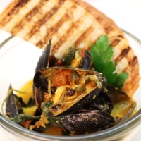 Image of saffron pumped mussels.