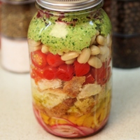 Image of a jar of the Spring Picnic Panzanella Salad