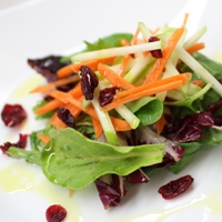 Image of Mixed Salad Greens with Apple Cider Cranberry Vinaigrette.