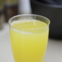 Image of a glass of the Sparkling Peach Bellini