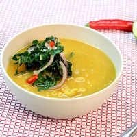 Image of split pea soup with fresh lime kale salad.