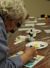 Image of woman creating artwork