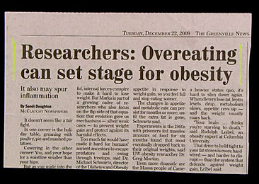 Newspaper headline that reads Researchers: Overeating can set stage for obesity