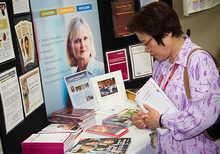 Image of woman viewing resource and support programs