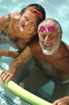 Image of a man and woman swimming