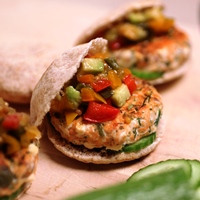 Image of super salmon sliders with bell pepper and avocado relish.