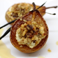 Image of maple caramelized pears stuffed with walnuts.