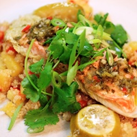 Image of thai napa wrapped fish with pineapple quinoa.