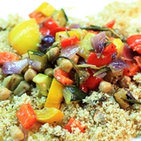 Image of roasted summer vegetables with fluffy porcini couscous.